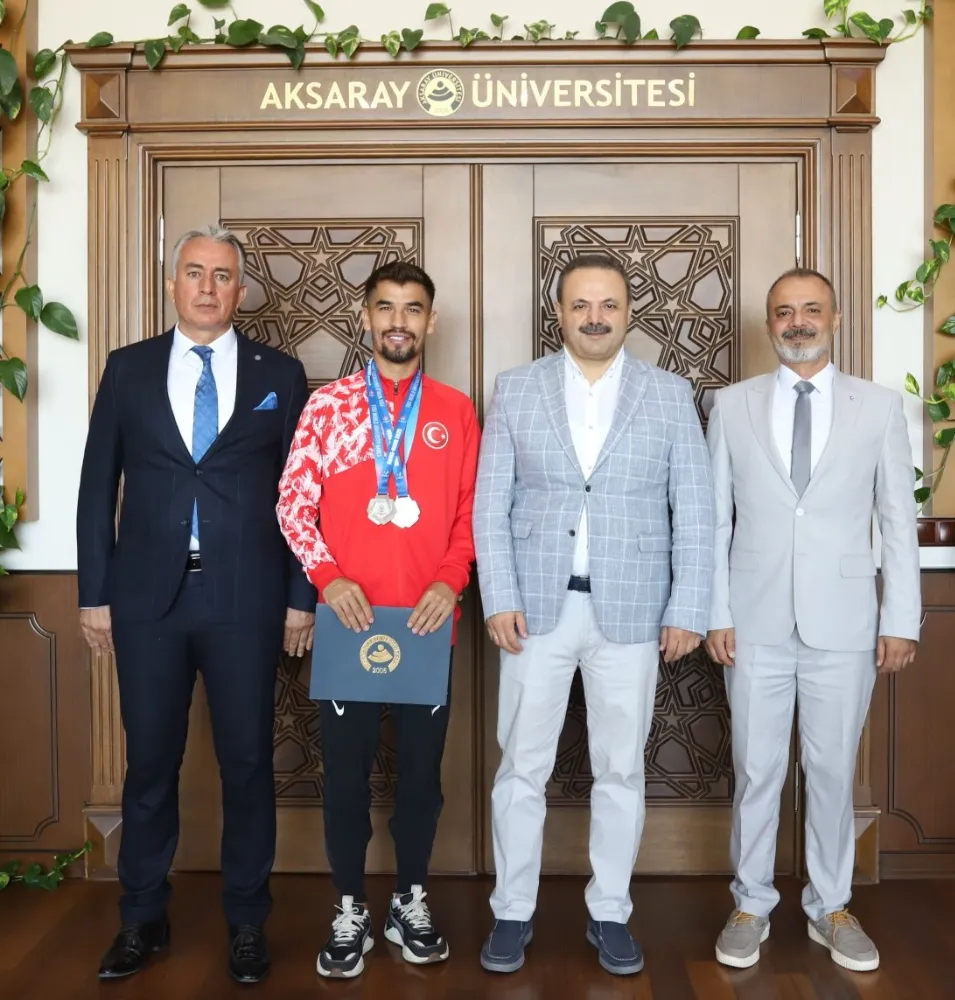 REKTÖR ARIBAŞ’TAN DÜNYA İKİNCİSİ OLAN  ASÜ’LÜ MİLLİ SPORCUYA TEŞEKKÜR BELGESİ